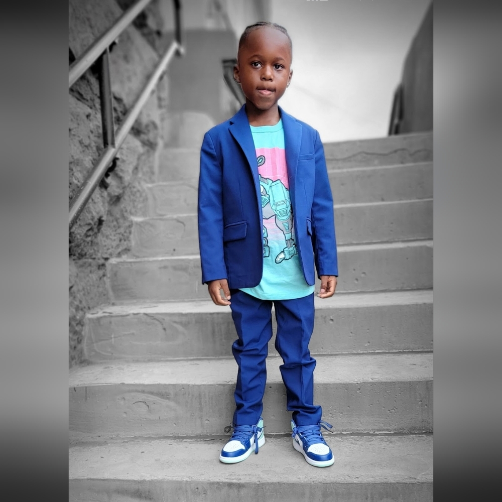 Boy blue suit goes great for any occasion.  Still in great condition!